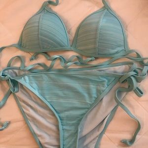Light blue Two-piece bikini, bottoms are a large, top is a medium